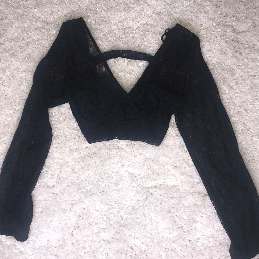 Woman’s black lace crop top